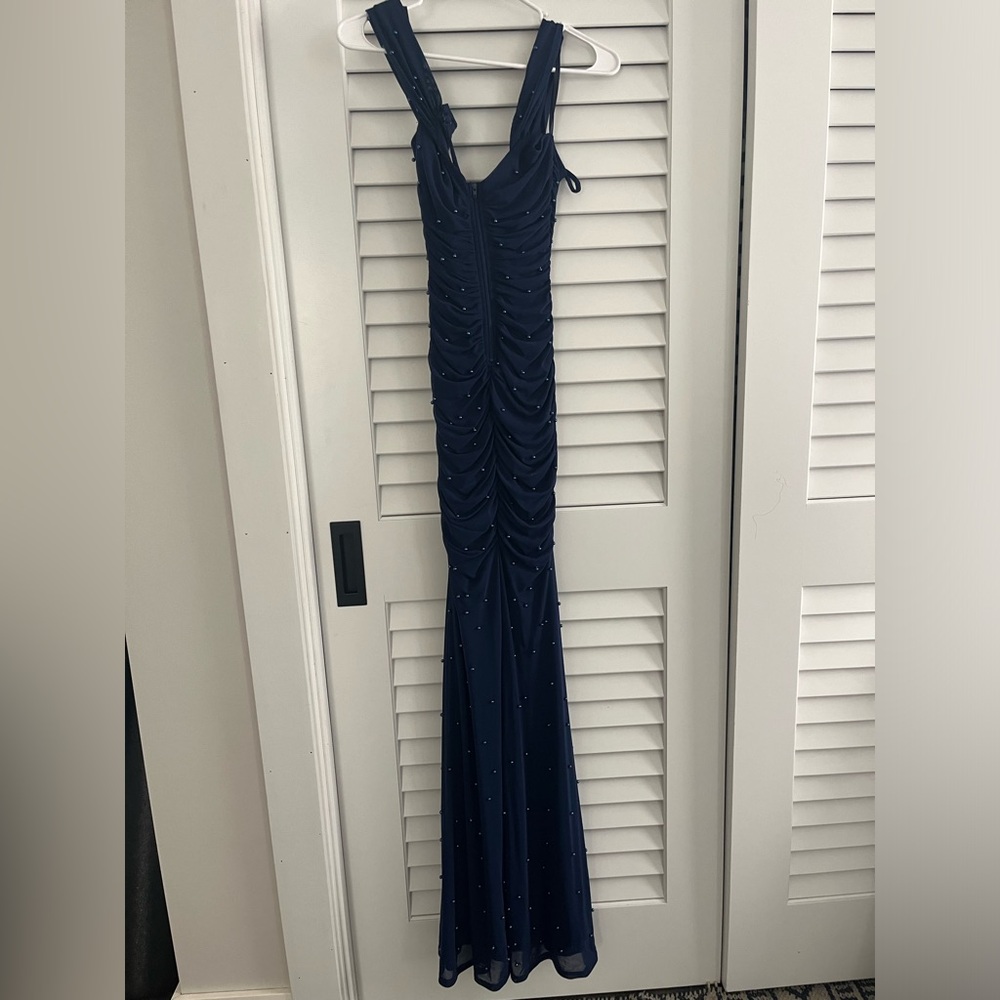 A navy blue prom dress.